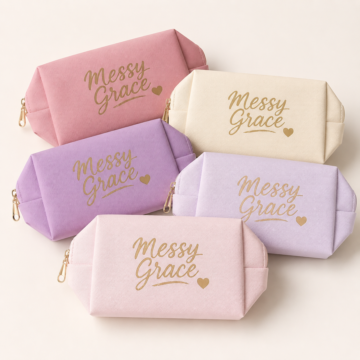 Messy Grace zippered pouches in assorted pastel colors